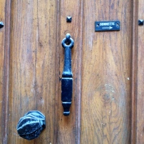 a doorknob, a knocker, and a sign!